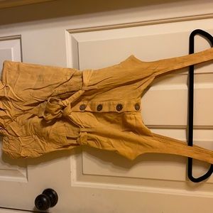 Small Women’s mustard romper NWT